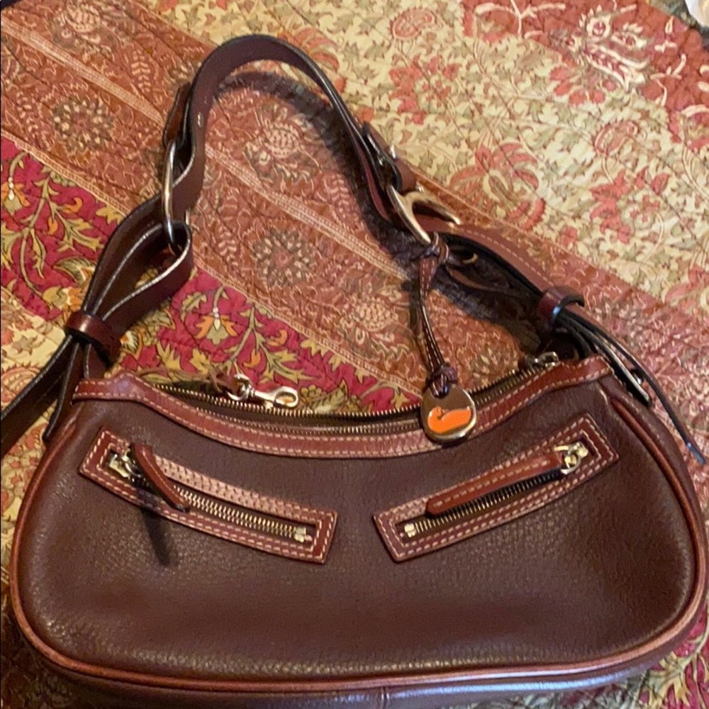 Dooney and Burke small hand bag in good condition